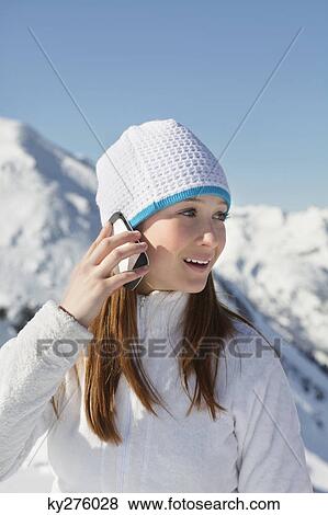 Teenage girl using mobile phone View Large Photo Image Stock Photo - Teenage girl using mobile phone. Fotosearch