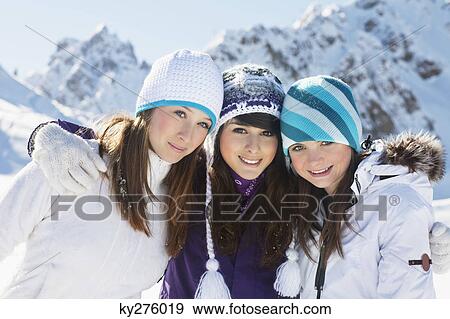 Three teenage girls in ski clothes, smiling at camera View Large Photo Image Stock Photo - Three teenage girls in ski clothes, smiling at camera. Fotosearch