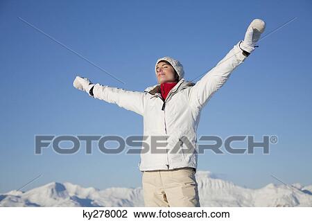 Young woman breathing fresh air View Large Photo Image Stock Image - Young woman breathing fresh air. Fotosearch