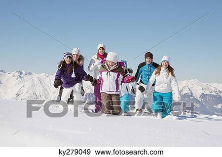 Family walking in snow View Large Photo Image Stock Photo - Family walking in snow. Fotosearch