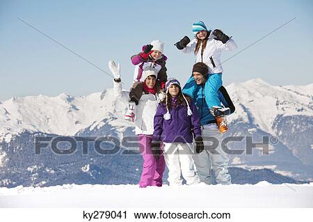 Happy family in snow View Large Photo Image Stock Image - Happy family in snow. Fotosearch