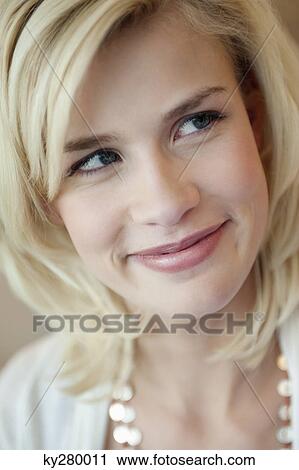 Close-up of a woman smiling View Large Photo Image Stock Image - Close-up of a woman smiling. Fotosearch