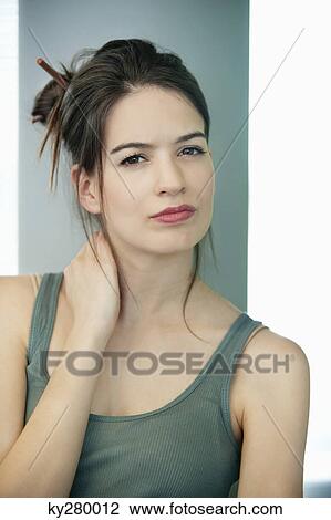 Close-up of a woman thinking View Large Photo Image Stock Image - Close-up of a woman thinking. Fotosearch