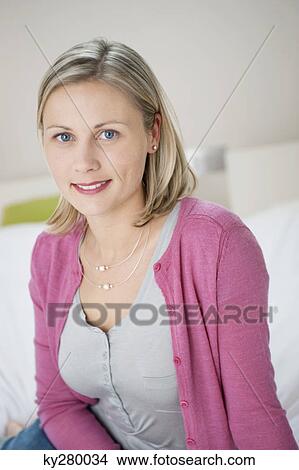 Portrait of a woman smiling View Large Photo Image Picture - Portrait of a woman smiling. Fotosearch