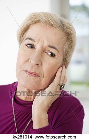 Close-up of a woman suffering from a toothache View Large Photo Image Picture - Close-up of a woman suffering from a toothache. Fotosearch