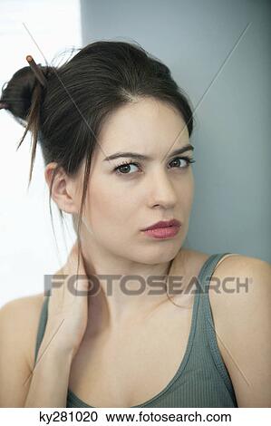 Portrait of a woman looking sad View Large Photo Image Stock Image - Portrait of a woman looking sad. Fotosearch