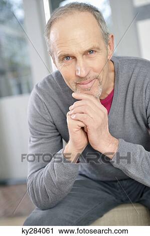 Portrait of a man smiling View Large Photo Image Stock Image - Portrait of a man smiling. Fotosearch