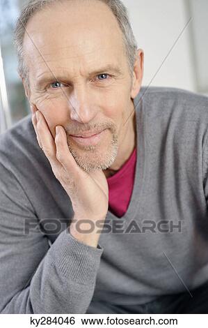 Portrait of a man smiling View Large Photo Image Stock Photograph - Portrait of a man smiling. Fotosearch