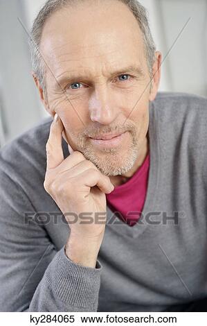 Stock Photography - Portrait of a man smiling. Fotosearch