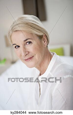 Portrait of a woman smiling View Large Photo Image Picture - Portrait of a woman smiling. Fotosearch