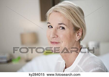 Portrait of a woman smiling View Large Photo Image Stock Photography - Portrait of a woman smiling. Fotosearch