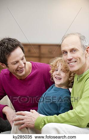 Family smiling together View Large Photo Image Stock Photography - Family smiling together. Fotosearch