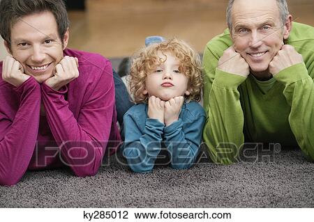 Portrait of a family smiling View Large Photo Image Stock Image - Portrait of a family smiling. Fotosearch