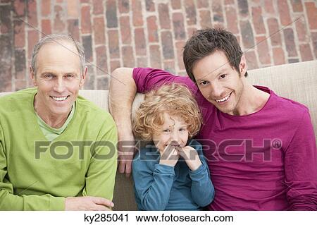 Portrait of a family smiling View Large Photo Image Stock Image - Portrait of a family smiling. Fotosearch