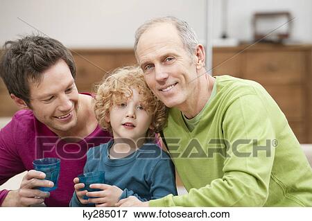 Stock Photo - Portrait of a family smiling. Fotosearch