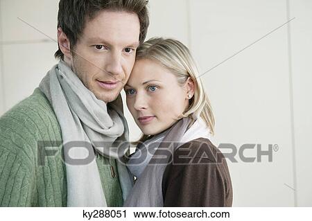 Stock Image - Close-up of a couple standing together. Fotosearch