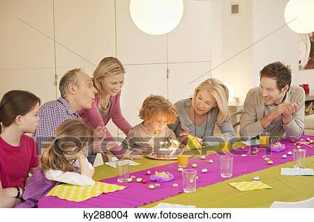 Family at a birthday celebration View Large Photo Image Picture - Family at a birthday celebration. Fotosearch