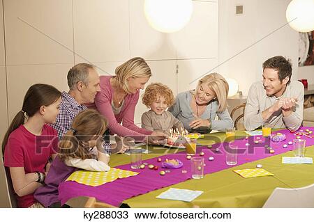 Family at a birthday celebration View Large Photo Image Stock Image - Family at a birthday celebration. Fotosearch