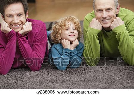 Portrait of a family smiling View Large Photo Image Stock Photograph - Portrait of a family smiling. Fotosearch