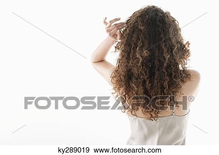 Rear view of a woman View Large Photo Image Stock Photo - Rear view of a woman. Fotosearch