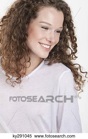 Close-up of a woman smiling View Large Photo Image Stock Photography - Close-up of a woman smiling. Fotosearch