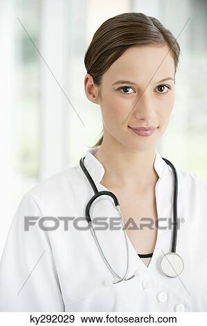 Stock Photo - Portrait of a female doctor. Fotosearch