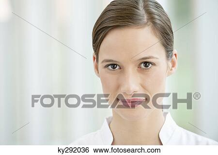 Portrait of a female doctor View Large Photo Image Stock Photograph - Portrait of a female doctor. Fotosearch