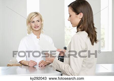 Woman reading a medical report View Large Photo Image Stock Image - Woman reading a medical report. Fotosearch