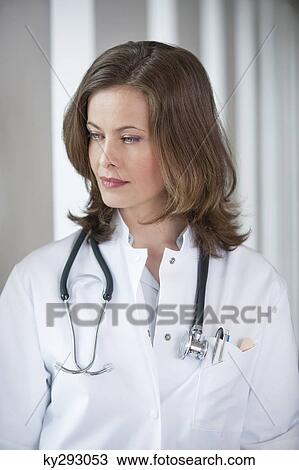 Female doctor thinking View Large Photo Image Stock Image - Female doctor thinking. Fotosearch