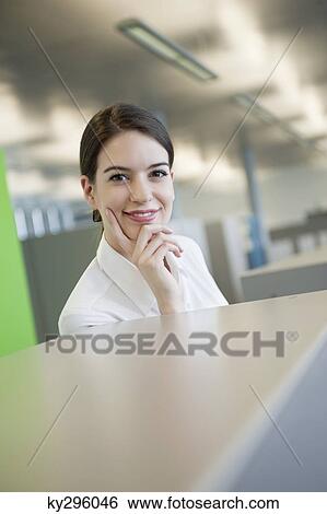 Portrait of a businesswoman smiling View Large Photo Image Stock Photograph - Portrait of a businesswoman smiling. Fotosearch