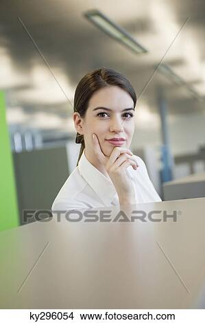 Portrait of a businesswoman thinking View Large Photo Image Picture - Portrait of a businesswoman thinking. Fotosearch