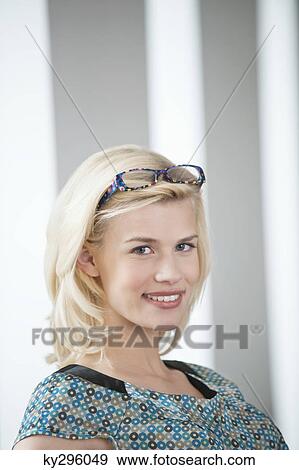 Portrait of a woman smiling View Large Photo Image Stock Photo - Portrait of a woman smiling. Fotosearch