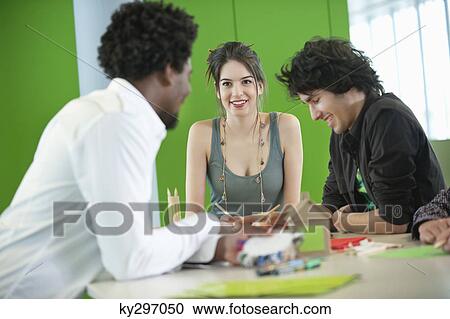 Business executives working in an office View Large Photo Image Stock Image - Business executives working in an office. Fotosearch