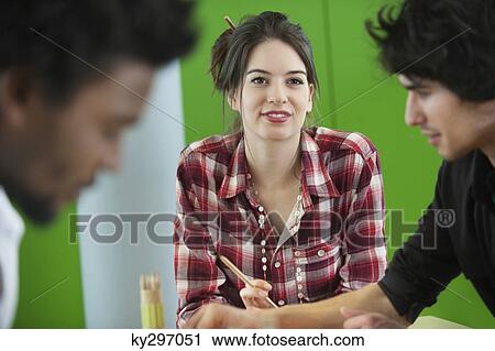 Business executives working in an office View Large Photo Image Stock Image - Business executives working in an office. Fotosearch