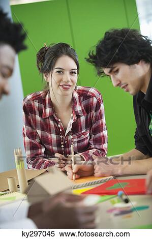 Business executives working in an office View Large Photo Image Stock Photography - Business executives working in an office. Fotosearch