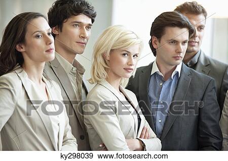 Business executives standing together View Large Photo Image Stock Photo - Business executives standing together. Fotosearch