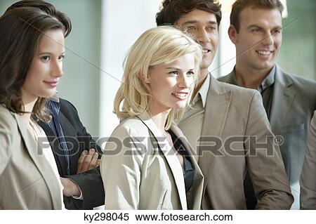Business executives standing together View Large Photo Image Stock Photography - Business executives standing together. Fotosearch