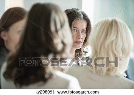 Businesswoman with her colleague View Large Photo Image Stock Image - Businesswoman with her colleague. Fotosearch