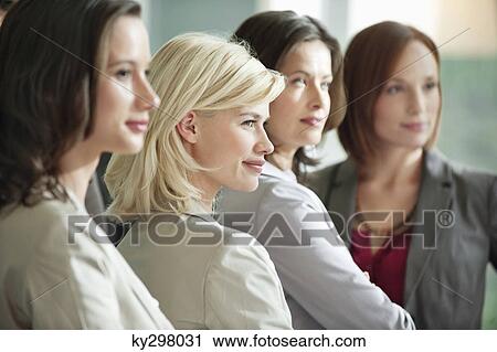 Businesswomen standing together View Large Photo Image Stock Image - Businesswomen standing together. Fotosearch