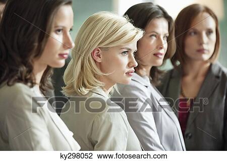 Businesswomen standing together View Large Photo Image Stock Image - Businesswomen standing together. Fotosearch