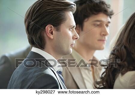 Close-up of a businessman with his colleague View Large Photo Image Stock Photo - Close-up of a businessman with his colleague. Fotosearch