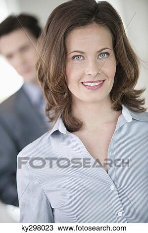 Stock Image - Portrait of a businesswoman smiling. Fotosearch