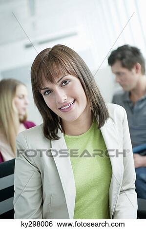 Portrait of a businesswoman smiling View Large Photo Image Stock Photograph - Portrait of a businesswoman smiling. Fotosearch