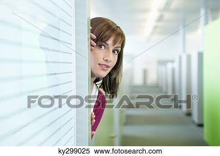 Businesswoman in an office corridor View Large Photo Image Stock Photography - Businesswoman in an office corridor. Fotosearch