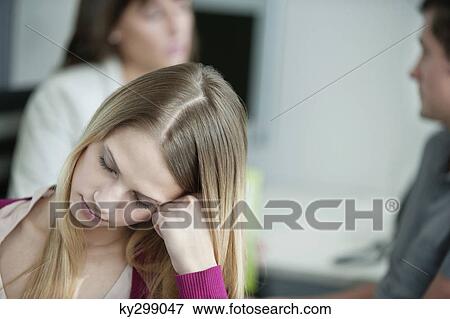 Businesswomen resting in an office View Large Photo Image Stock Photo - Businesswomen resting in an office. Fotosearch