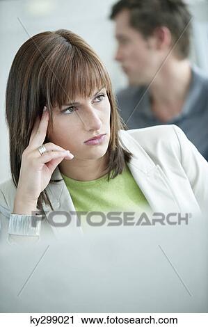 Close-up of a businesswoman thinking View Large Photo Image Stock Image - Close-up of a businesswoman thinking. Fotosearch