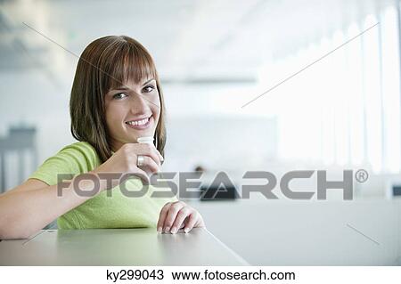 Portrait of a businesswoman drinking probiotic drink View Large Photo Image Stock Image - Portrait of a businesswoman drinking probiotic drink. Fotosearch