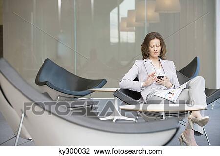 Woman listening to an MP3 player View Large Photo Image Stock Image - Woman listening to an MP3 player. Fotosearch