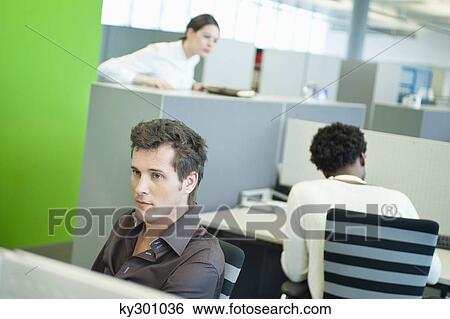 Business executives working in an office View Large Photo Image Stock Photograph - Business executives working in an office. Fotosearch
