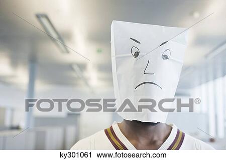 Businessman wearing a paper bag of sad face View Large Photo Image Stock Image - Businessman wearing a paper bag of sad face. Fotosearch